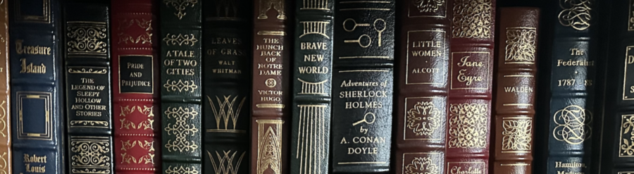 Classic hardcover books on a shelf.