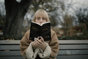 Girl reading a book. ARC books.